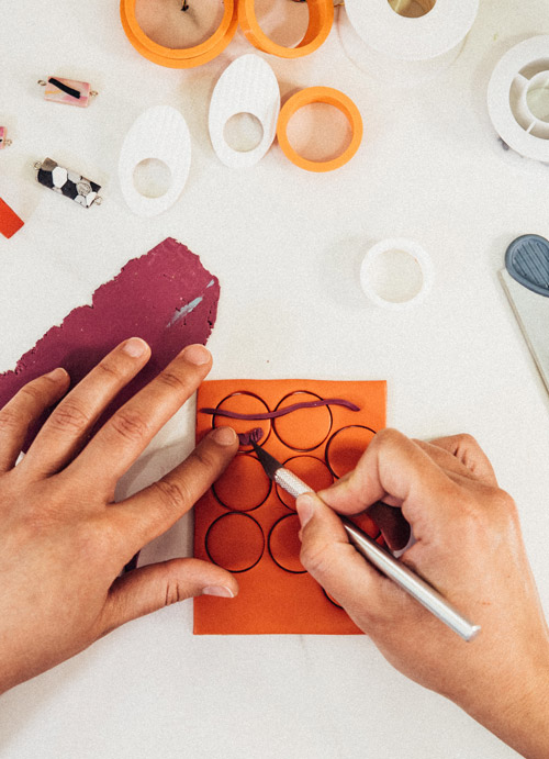 hands crafting jewellery