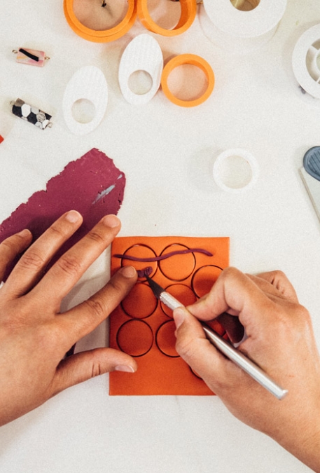 hands crafting jewellery