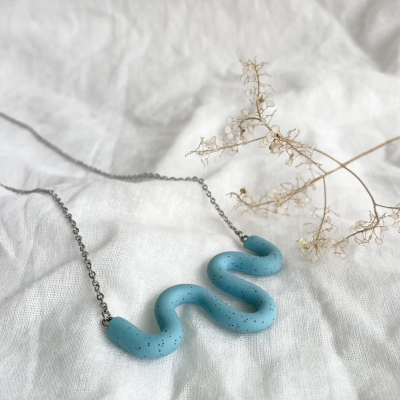 abstract light blue curvy handmade polymer clay necklace with surgical stainless steel chain
