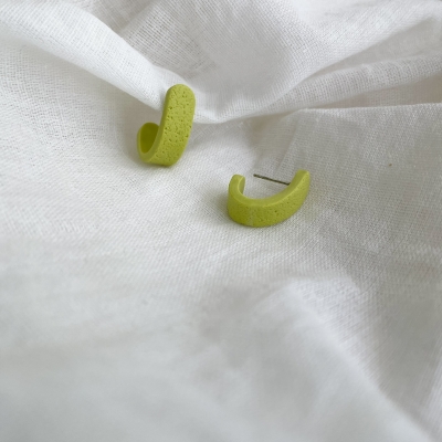 handmade, small, fluo yellow hoop earrings made from polymer clay