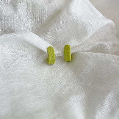 handmade, small, fluo yellow hoop earrings made from polymer clay