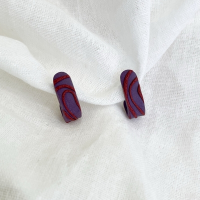 handmade, small, dark purple textured with red lines hoop earrings from polymer clay