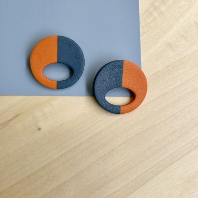 handmade grey and bold orange circle polymer clay earrings with stainless steel backs