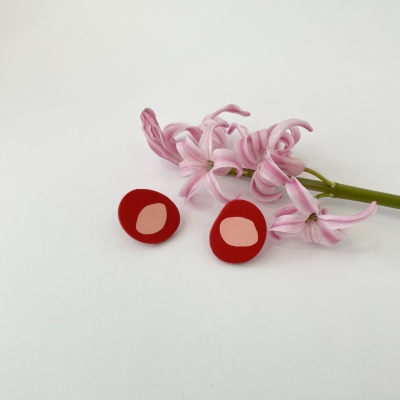 handmade polymer clay earrings abstract red circle with pink center dot and surgical stainless steel backs