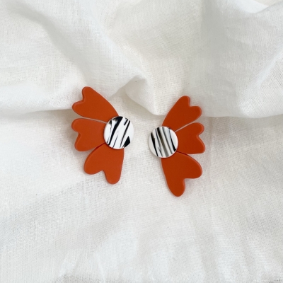 handcracted orange abstract flower polymer clay earrings with surgical stainless steel backs