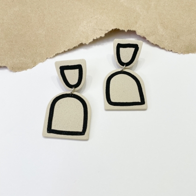  beige handmade arch shape polymer clay earrings with grey lines