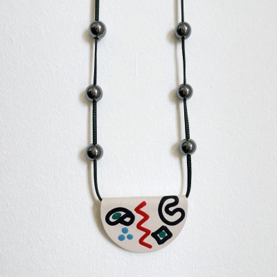 handmade necklace polymerclay motif, cord and hematite stones