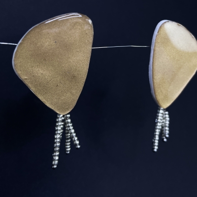 abstract shape polymer clay handcrafted earrings with gold shiny serface, silver bead tail and stainless steel backs