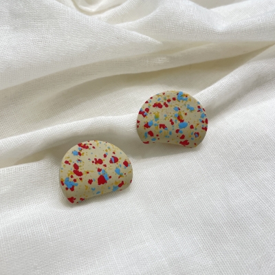 Handcrafted polymer clay earrings cream terrazzo and curved circle shape stainless steel backs 