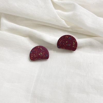 Handmade polymer clay earrings dark red colour and curved circle shape