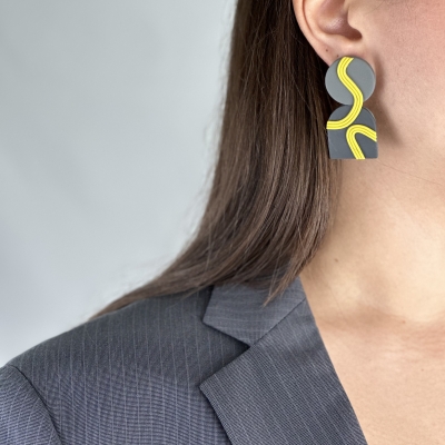 Handmade earrings in grey tones and yellow lines 