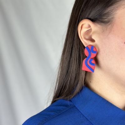 Handmade earrings in red tones and blue lines
