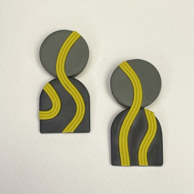 Handmade earrings in grey tones and yellow lines