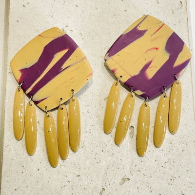Handcrafted dangle polymer clay earrings light yellow and purple colour 