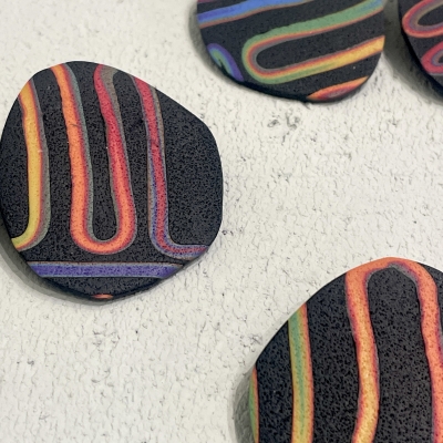 Black with colourful lines handmade polymer clay earrings 
