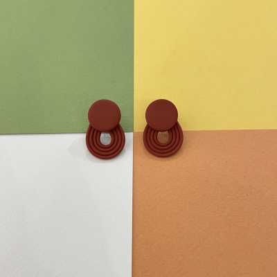 Polymer clay earrings with terracotta little circle and stripes