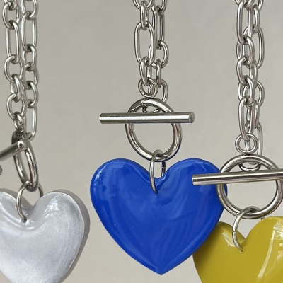 Handmade necklace with stainless steel chain and polymer clay blue shiny heart motif 